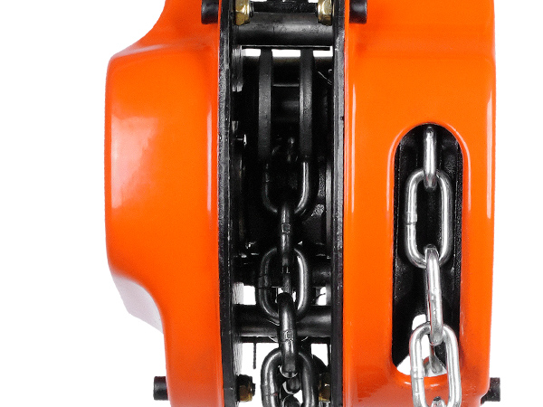 close-up view of an orange VEVOR hand chain hoist mechanism showcasing its internal chains.