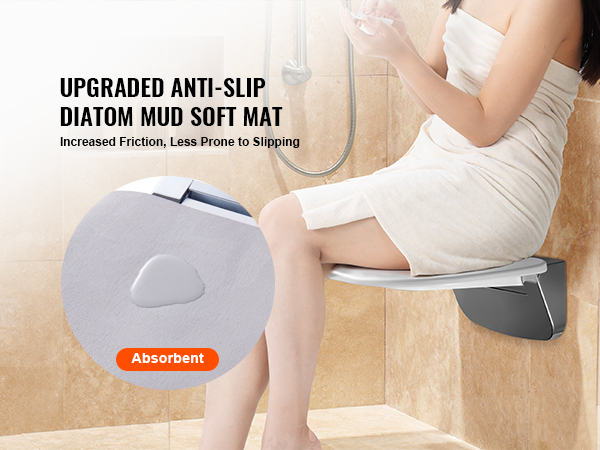 woman sitting on VEVOR folding shower seat with diatom mud soft mat for better grip in modern bathroom.
