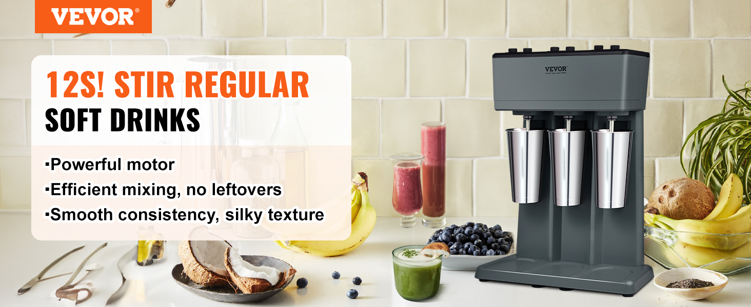 VEVOR milkshake maker with three stainless steel cups, fruit, and beverages on a kitchen counter.