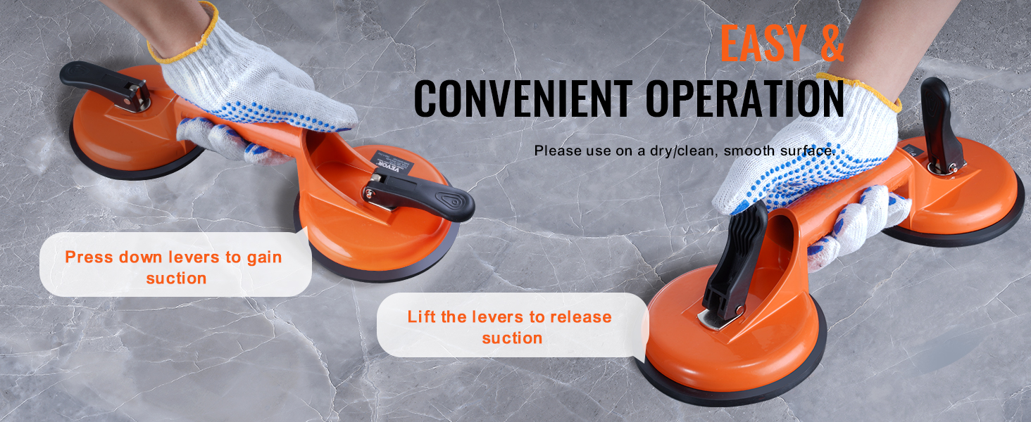 orange VEVOR glass suction cup being used on smooth, dry surface with text instructions for lever operation.
