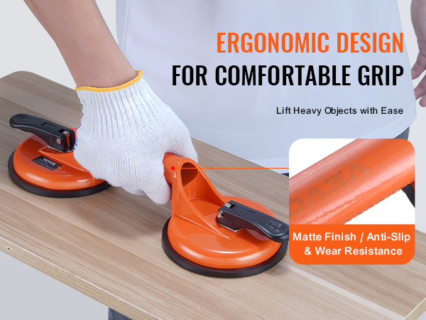 VEVOR glass suction cup lifting a wooden panel with anti-slip, wear-resistant matte finish for a comfortable grip.