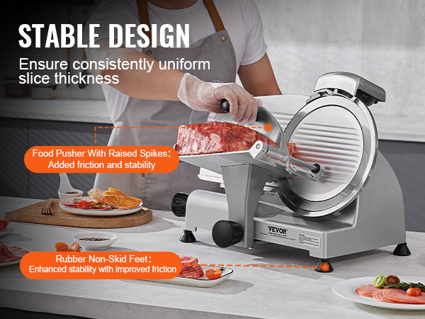 VEVOR meat slicer in action, featuring a stable design, food pusher with spikes, and rubber non-skid feet.