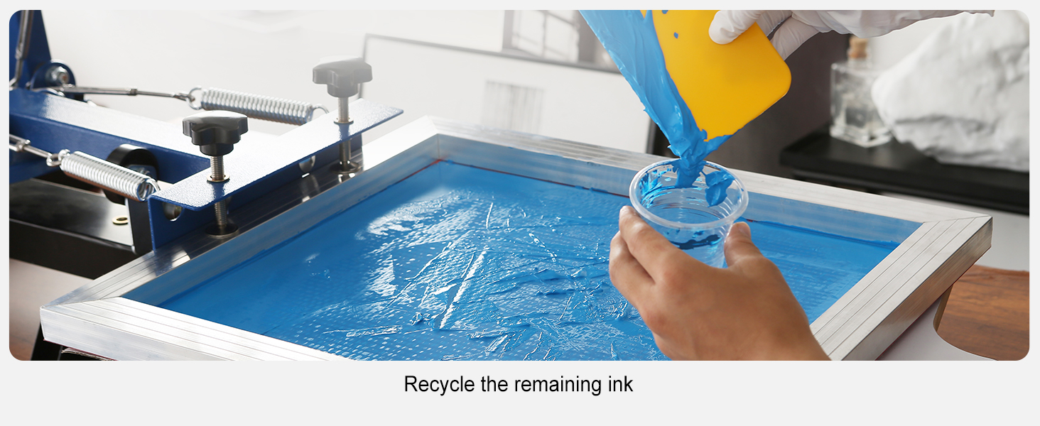 hand scraping blue ink into container on a VEVOR screen printing kit frame.