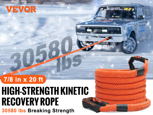 VEVOR kinetic recovery tow rope with 30580 lbs breaking strength towing a vehicle in snowy conditions.