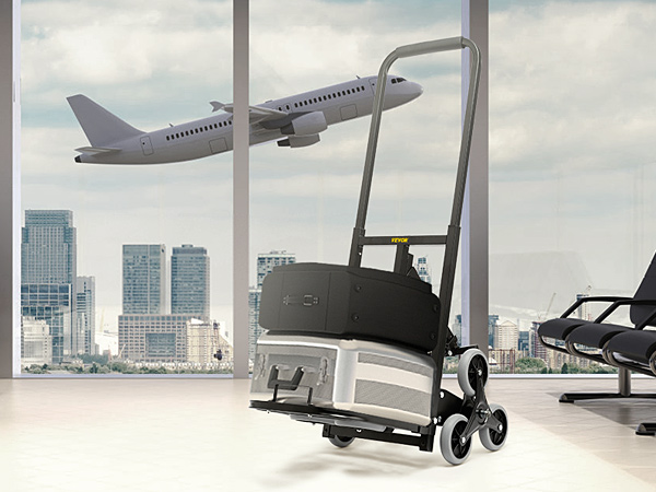 VEVOR stair climbing hand truck in an airport terminal with city skyscrapers and airplane in view.