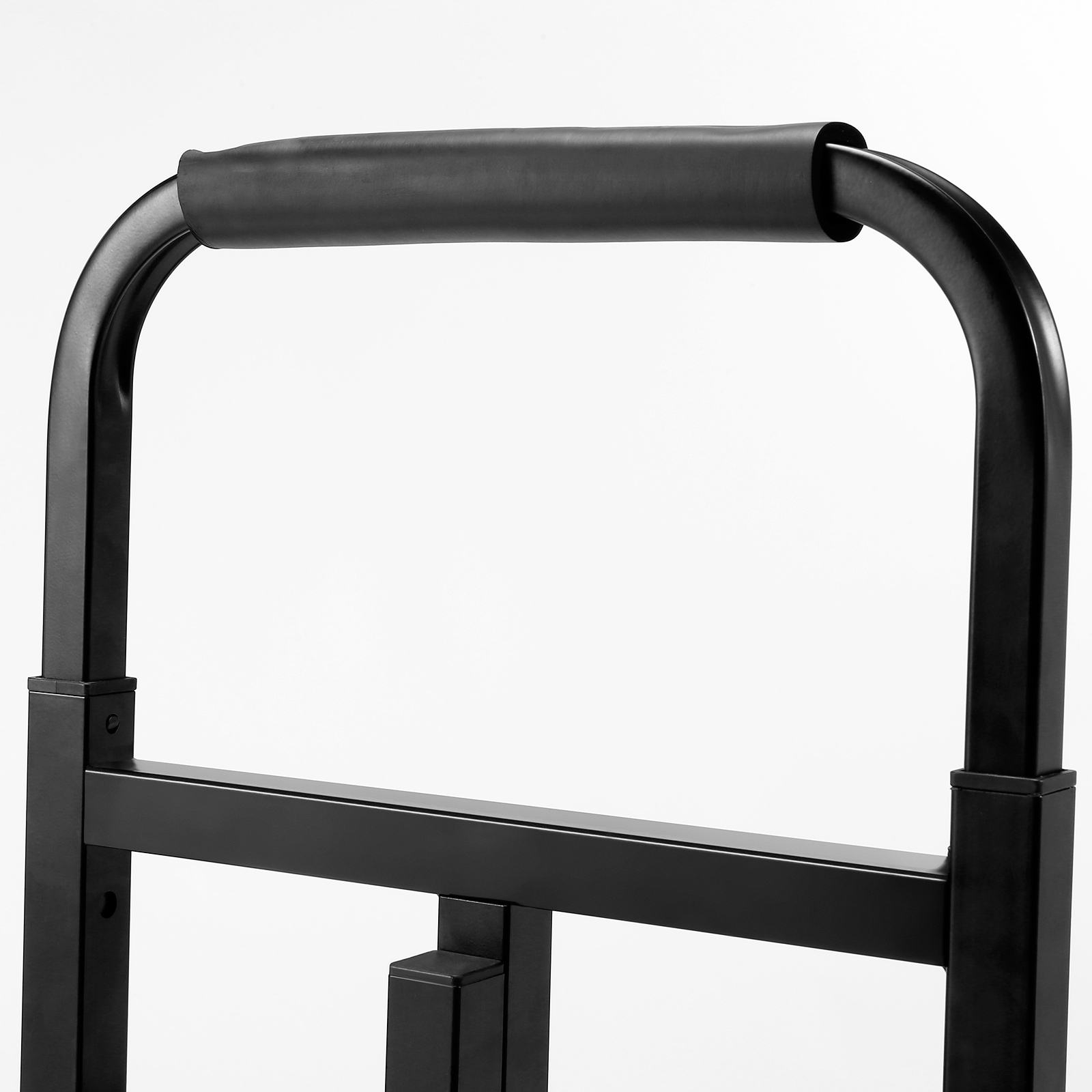 handle of VEVOR stair climbing hand truck with padded grip and sturdy black metal frame.