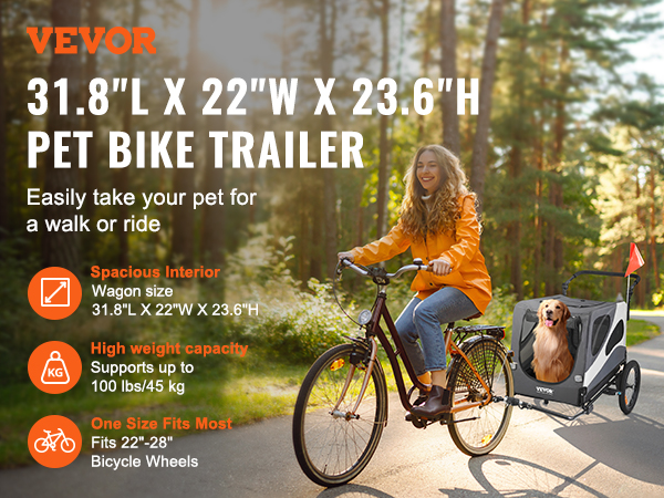 VEVOR dog bike trailer being pulled by a cyclist in a forest, showcasing its spacious interior.