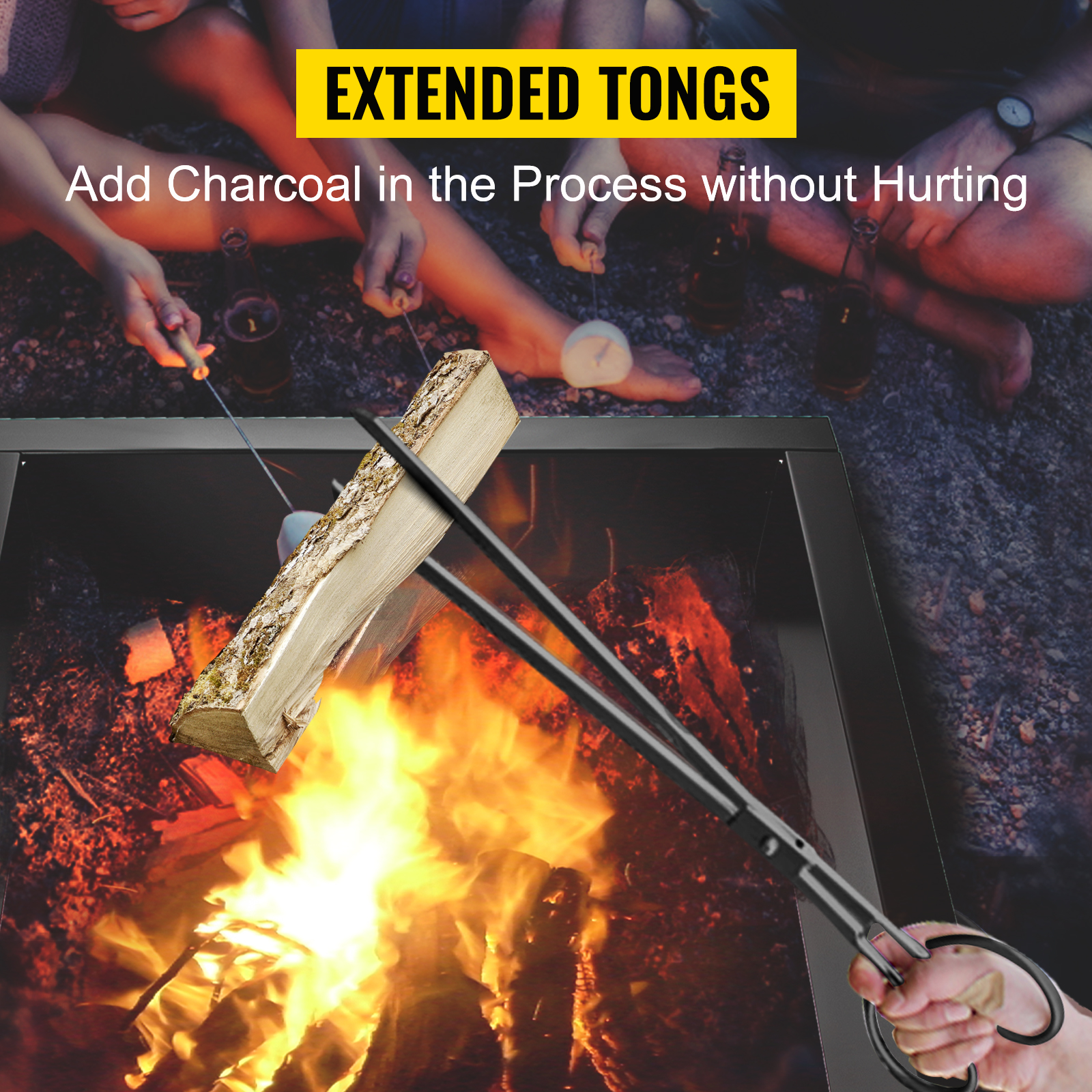 extended tongs adding a log to a VEVOR fire pit ring with people sitting around.