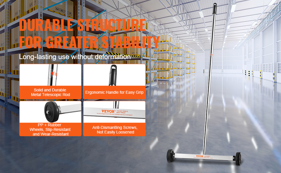 VEVOR magnetic sweeper in a warehouse with durable metal handle, ergonomic grip, and slip-resistant wheels.