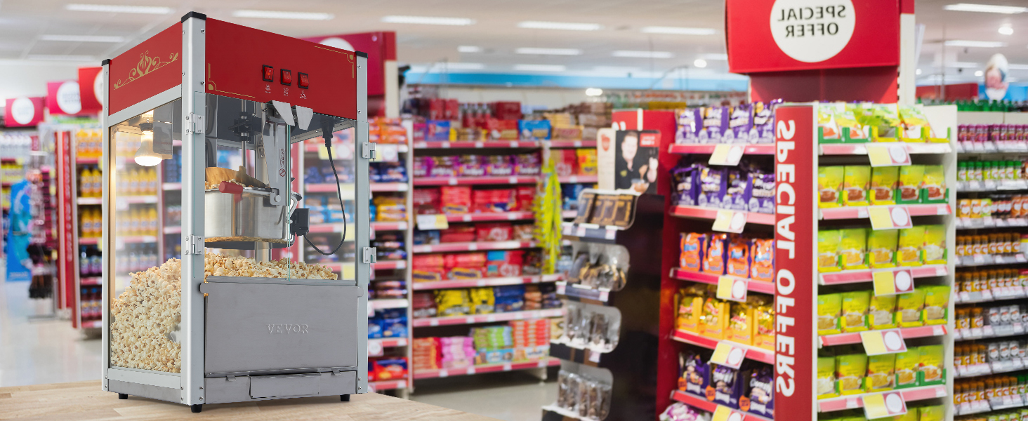 Машина для приготовления попкорна VEVOR в оживленном ряду супермаркета, где представлены закуски и специальные предложения.