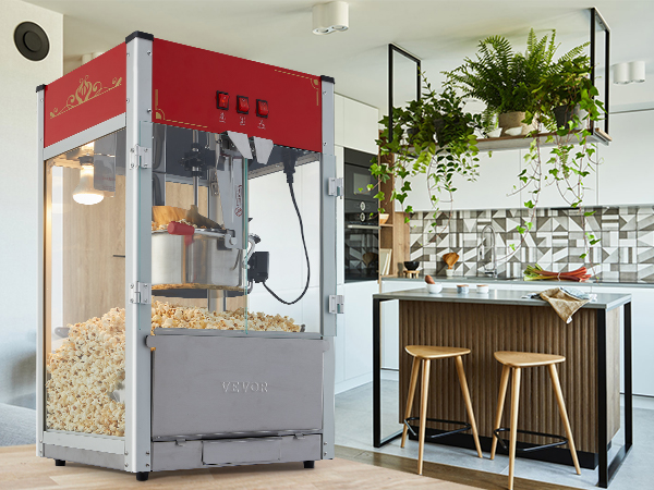 Машина для приготовления попкорна VEVOR на современной кухне с деревянными вставками и подвесными растениями.