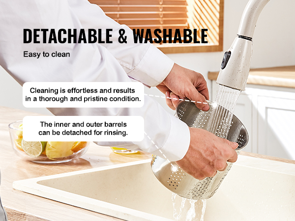 detachable and washable VEVOR fruit wine press being cleaned under a faucet in a kitchen sink.