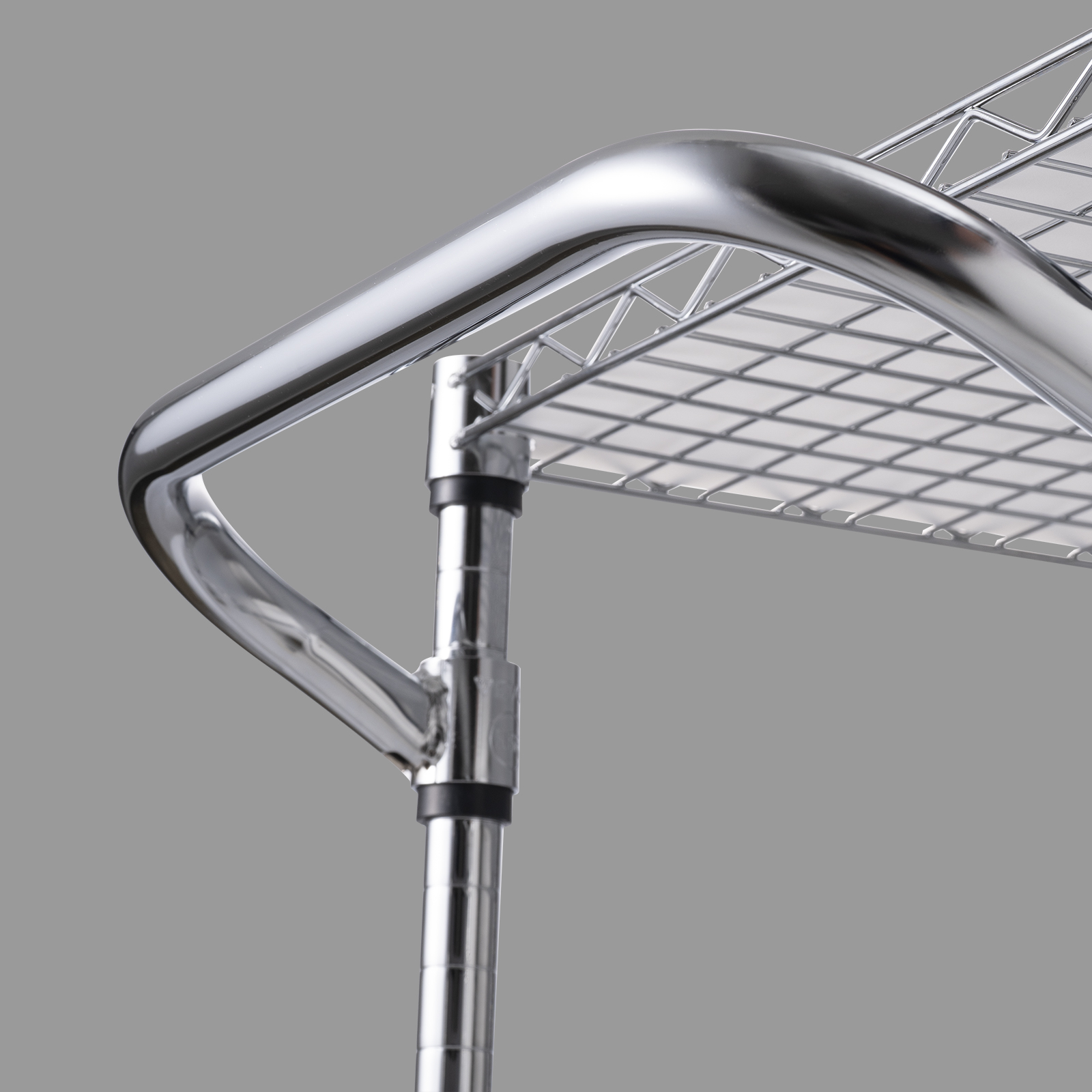 close-up of the top shelf of the VEVOR 3-tier utility cart with chrome finish and sturdy metal construction.