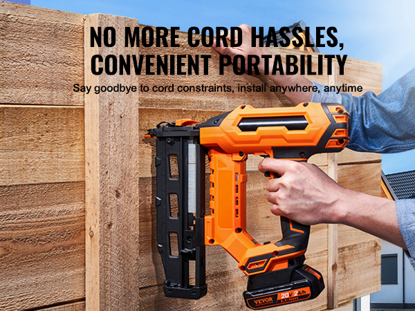 VEVOR cordless finish nailer in use on a wooden fence, highlighting portability and convenience.