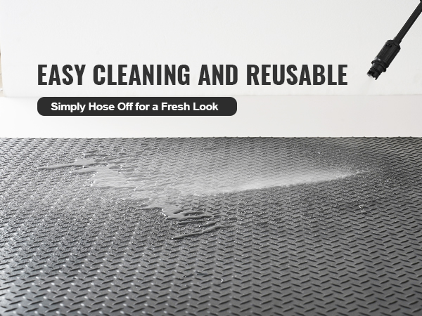 easy cleaning and reusable VEVOR diamond-plate rubber flooring roll being hosed off for a fresh look.