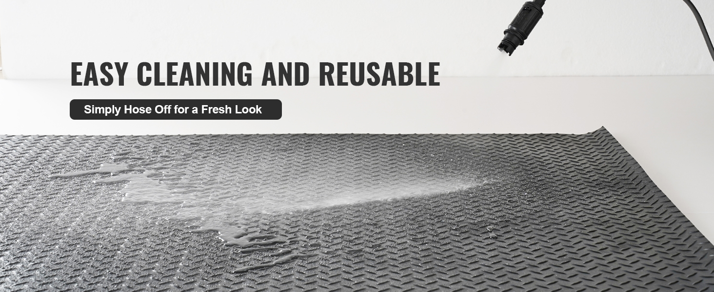 easy cleaning and reusable VEVOR diamond-plate rubber flooring roll being hosed off for a fresh look.