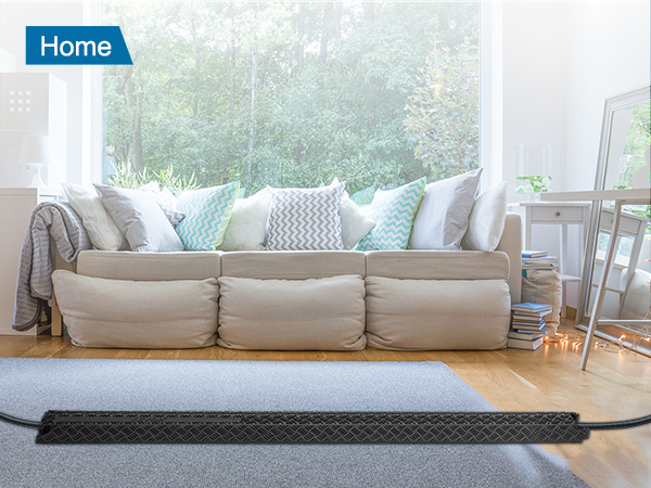 VEVOR speed bump in cozy living room with sofa, decorative pillows, blue carpet, and home decor accents.