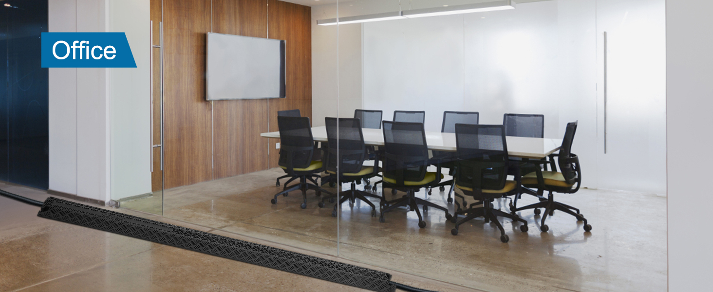 modern office conference room with glass walls, office chairs, and VEVOR speed bump on the floor.