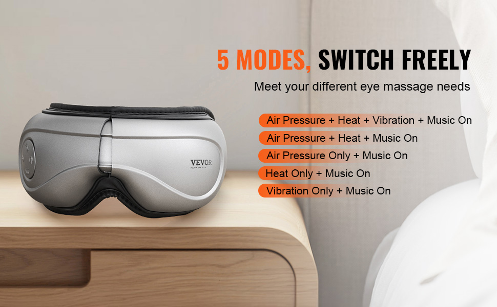 VEVOR heated eye massager on wooden table, offering 5 adjustable modes for personalized relaxation.