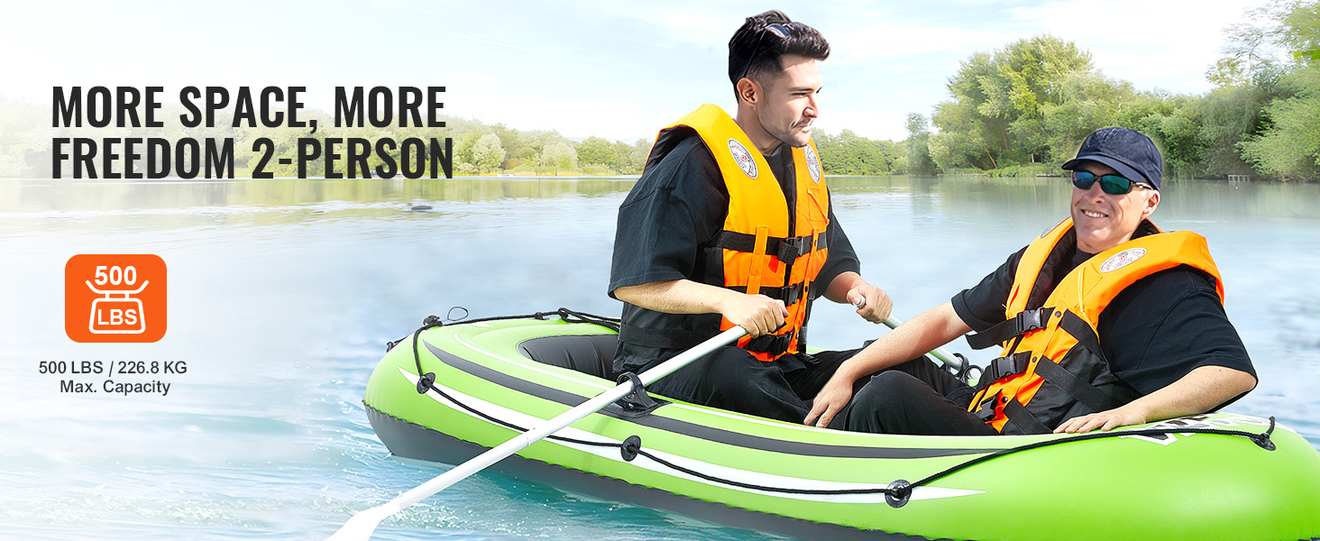 VEVOR inflatable fishing boat, two people paddling on a lake, wearing orange life jackets, 500 lbs capacity.