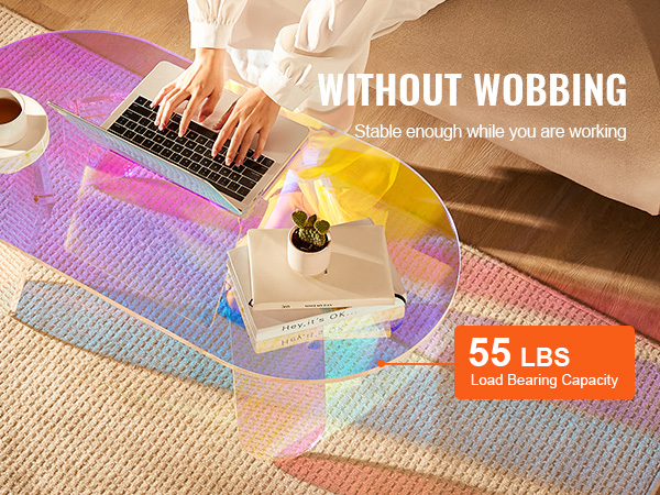 VEVOR acrylic coffee table with 55 lbs load capacity, featuring a colorful design in a cozy living area.