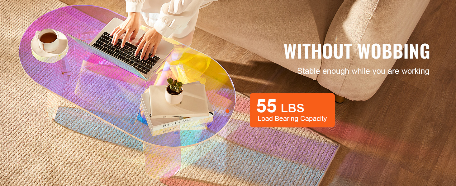 VEVOR acrylic coffee table with 55 lbs load capacity, featuring a colorful design in a cozy living area.