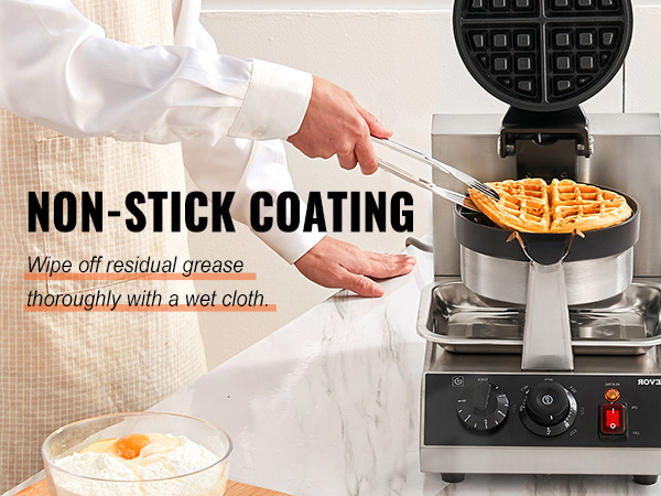 person using the VEVOR waffle maker with non-stick coating on a marble countertop.