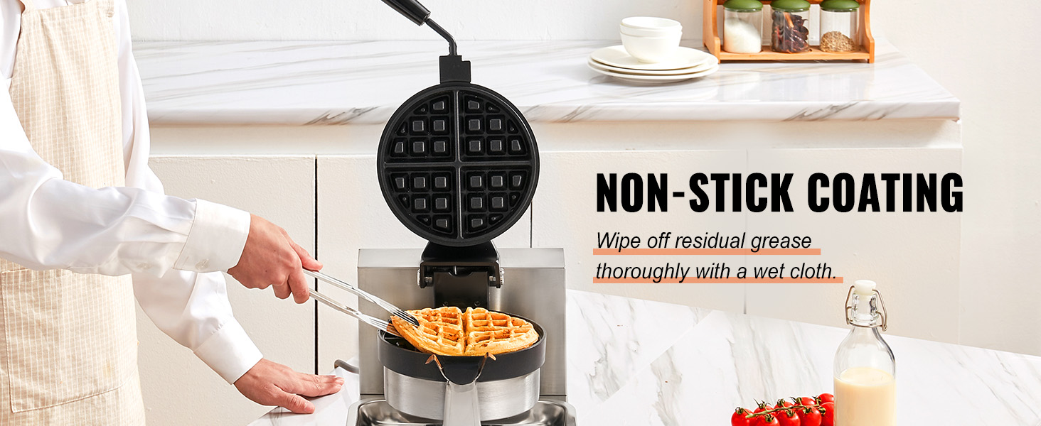 person using the VEVOR waffle maker with non-stick coating on a marble countertop.