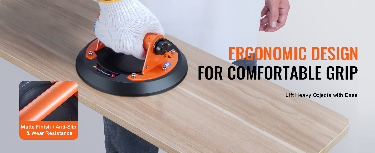 person using VEVOR glass suction cup to lift a wooden board, showcasing ergonomic design and a matte finish.
