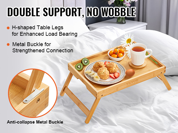 VEVOR bed tray table with sturdy h-shaped legs, metal buckle, and a breakfast spread on a bed.