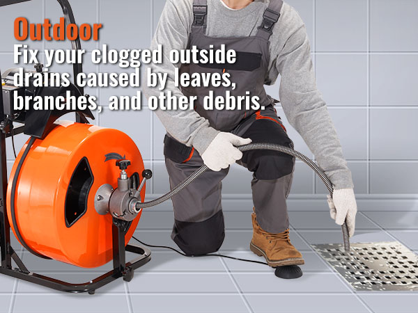 man using VEVOR drain cleaning machine, unclogging outdoor drain in tiled area.