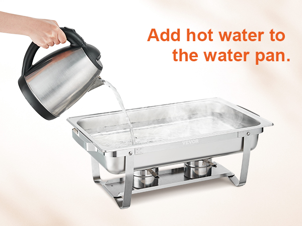 pouring hot water into the VEVOR chafing dish set water pan for heating