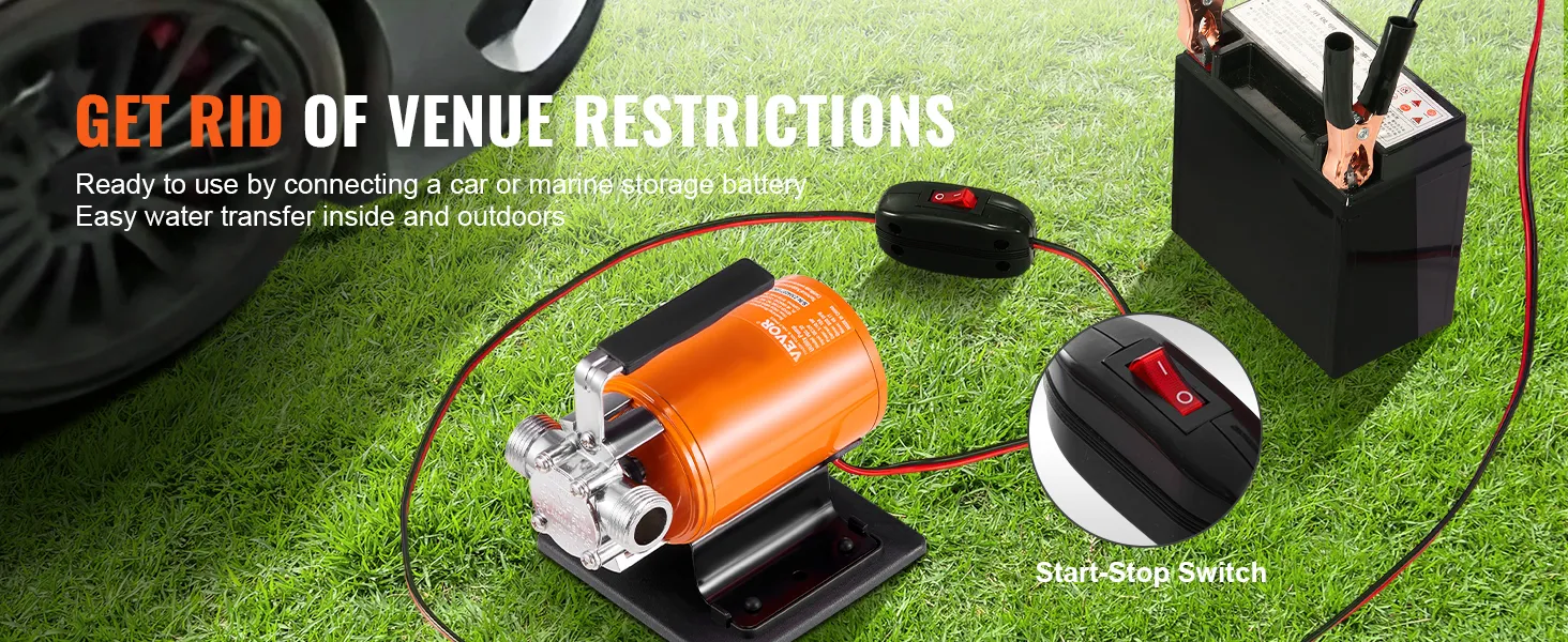 VEVOR water transfer pump connected to a battery on grass, ready for indoor and outdoor use.