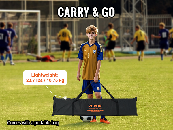 soccer player carrying the VEVOR soccer rebounder net in a portable bag on a field with teammates.