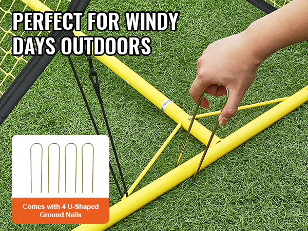 VEVOR soccer rebounder on grass with u-shaped ground nails for stability, perfect for windy days outdoors.