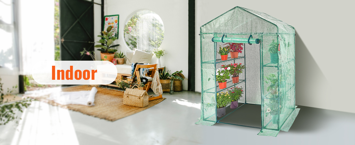 VEVOR walk-in greenhouse situated indoors surrounded by plants, basket, and a cozy chair.