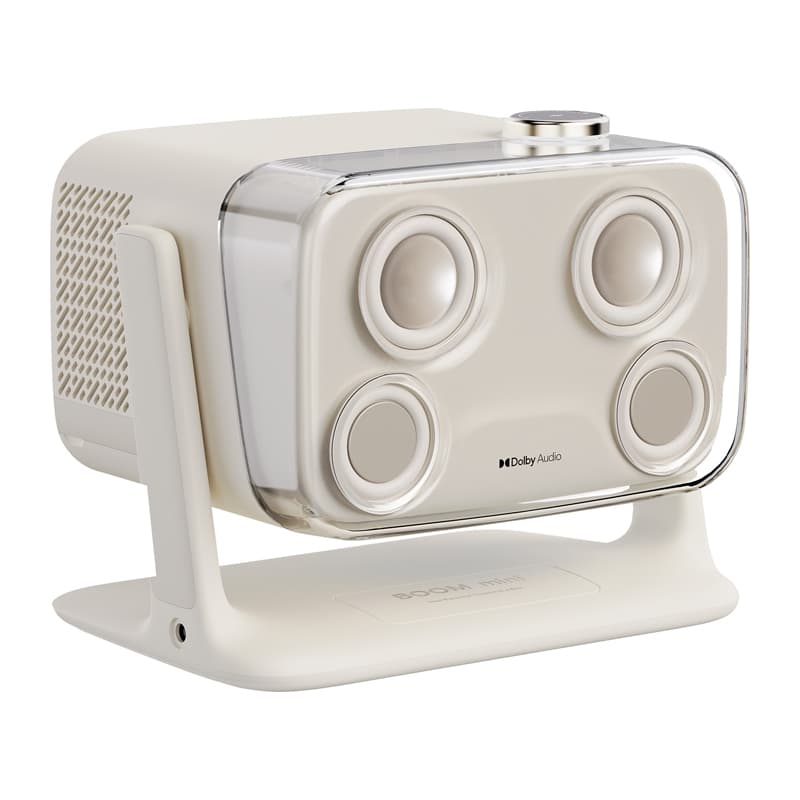 White portable speaker with four circular drivers on the front and a curved stand, Dolby Audio branding visible