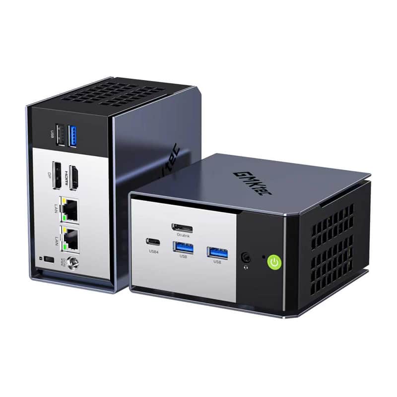 Two compact mini PCs with silver front panels displaying multiple USB ports, Ethernet jacks, and a green power button.