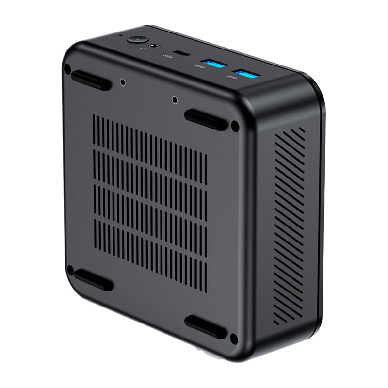 Kompaktne must mini PC ventilatsioonipesadega ja kahe USB 3.0 pordiga peal, näidatud nurga all