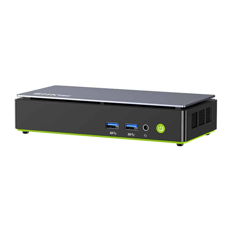 Mini PC or compact desktop with two USB 3.0 ports, audio jack, green power button, and lime-green base edge, viewed from front-left side