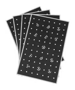 Fan of black perforated cards with white dots and circular holes.
