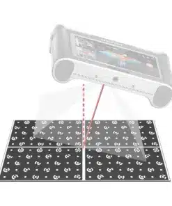 Handheld projector casting a red beam onto a grid of black tiles with white circular patterns, on the floor.