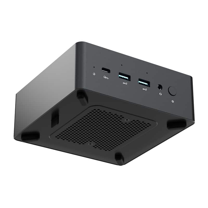 Must mini lauaarvuti altvaates, millel on esipaneel USB-C, kaks USB-A, 3,5 mm pesa ja toitenupp.